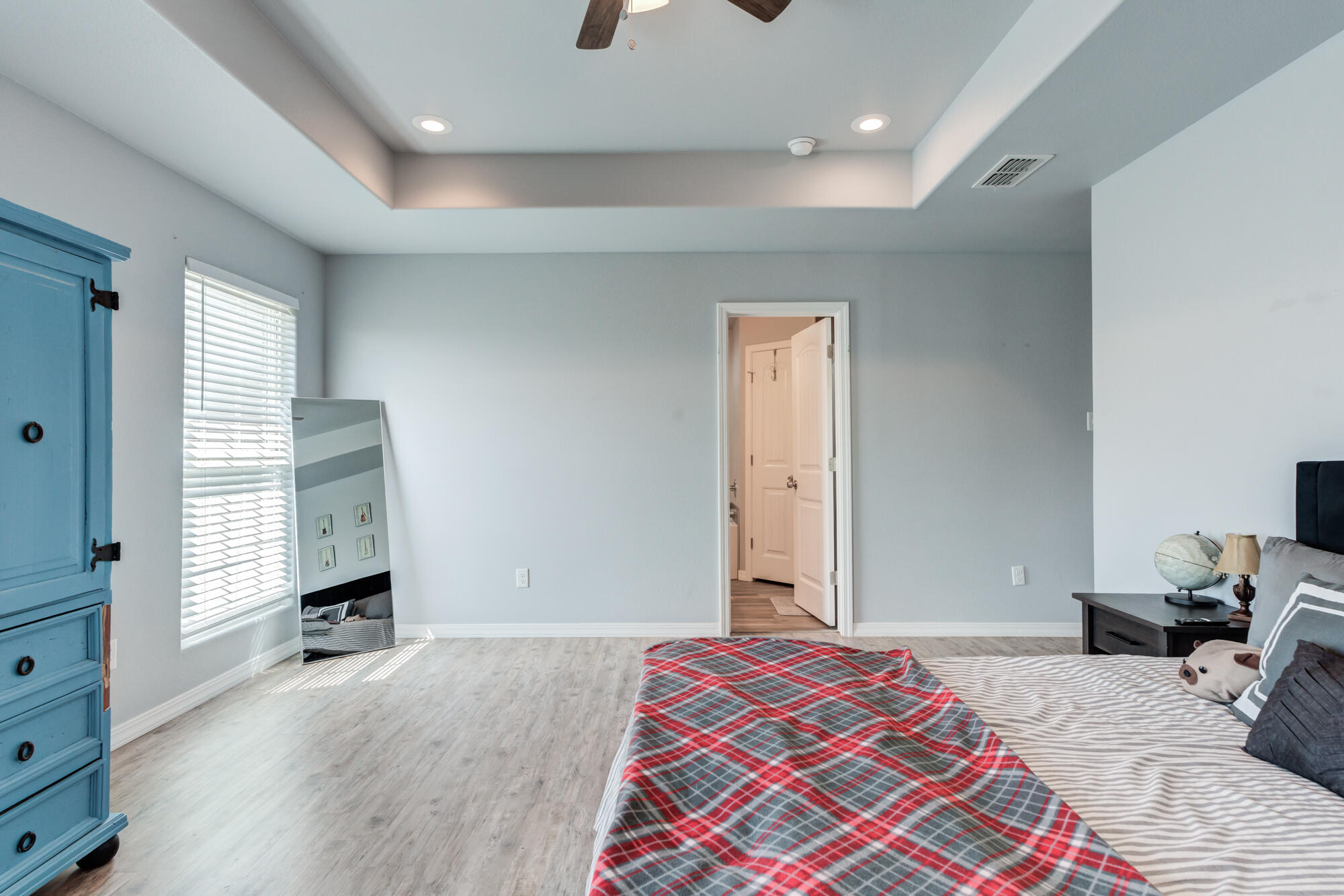 8801 15th Street Lubbock, TX 79416 - Photo 14 of 32 a bedroom with a bed and a window