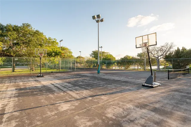 a view of a park with swings