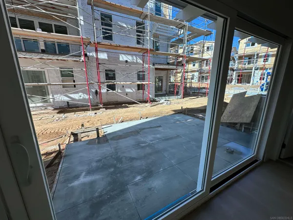 a view of living room with balcony