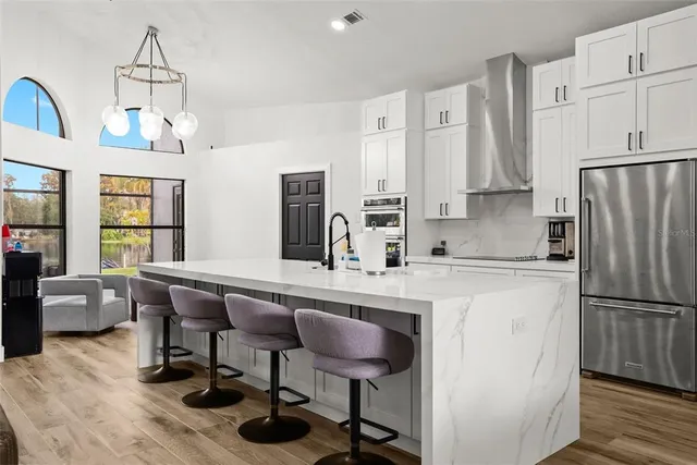 a view of living room with granite countertop furniture and fireplace