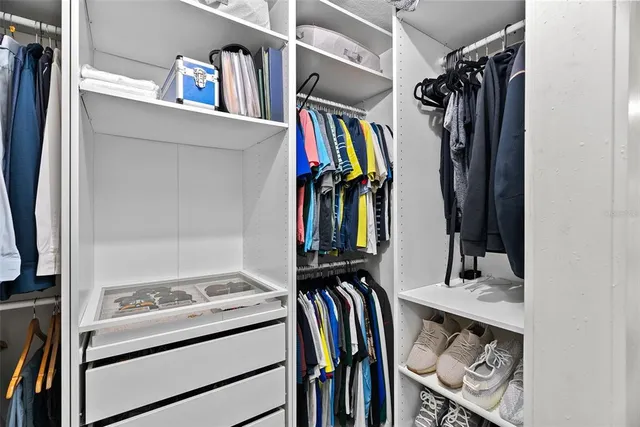 a white toilet sitting next to a window