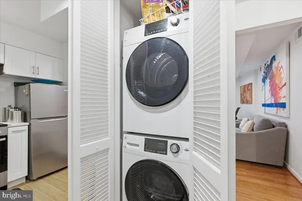 a utility room with dryer and washer