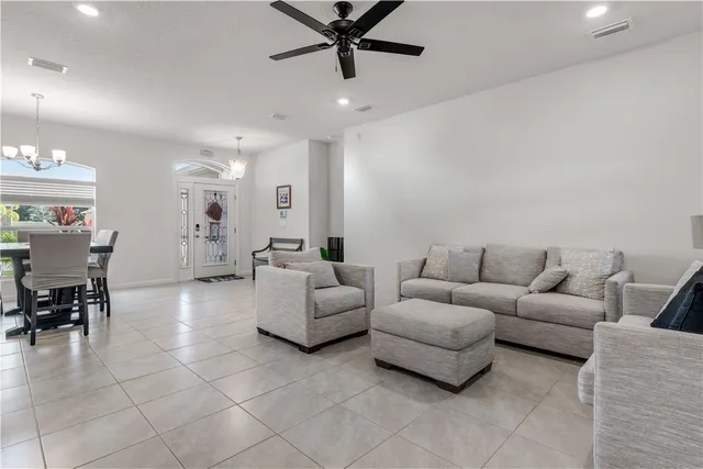 a living room with furniture and a table