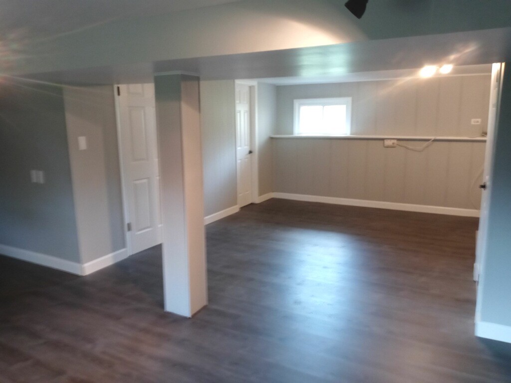 S528 Finley Road Lombard, IL 60148 - Photo 15 of 28 an empty room with wooden floor and windows