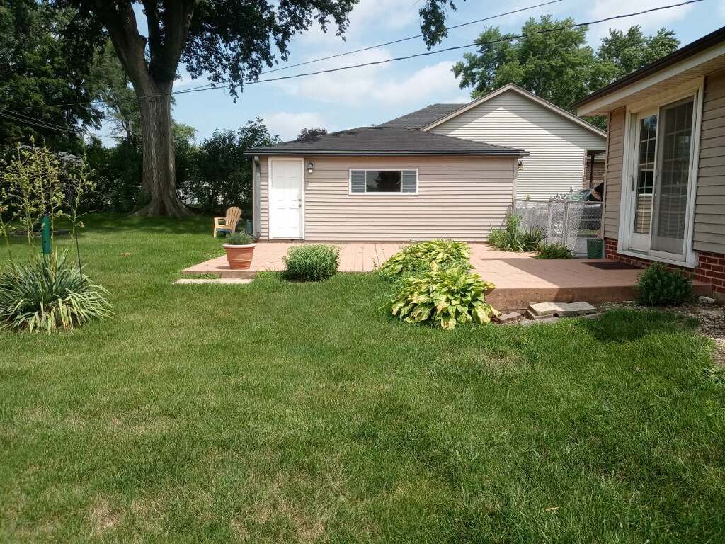 S528 Finley Road Lombard, IL 60148 - Photo 26 of 28 a view of backyard of house with green space