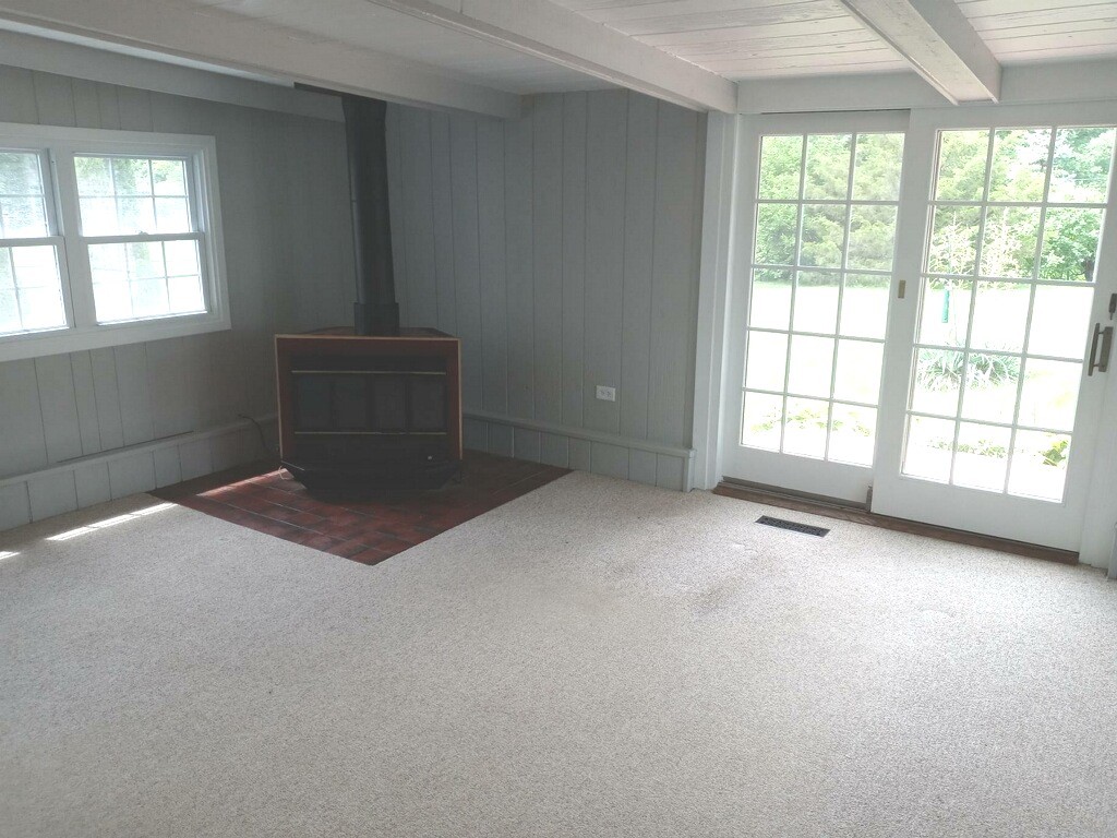 S528 Finley Road Lombard, IL 60148 - Photo 7 of 28 a view of an empty room with a window