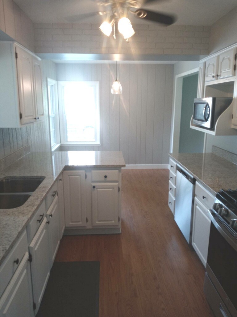 S528 Finley Road Lombard, IL 60148 - Photo 10 of 28 a view of a kitchen cabinets and a stove