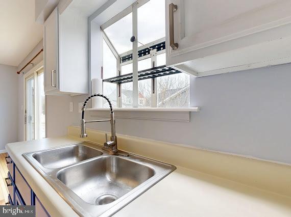 8 Rutherford Place Harpers Ferry, WV 25425 - Photo 15 of 33 a kitchen with a sink and a window
