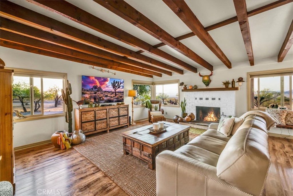 4565 Rock Corral Road Johnson Valley, CA 92285 - Photo 11 of 75 a living room with furniture and a fireplace
