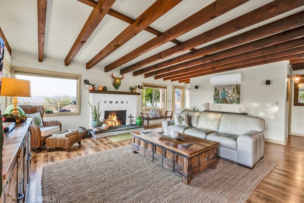 4565 Rock Corral Road Johnson Valley, CA 92285 - Photo 12 of 75 a living room with furniture and a fireplace