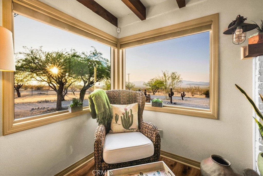 4565 Rock Corral Road Johnson Valley, CA 92285 - Photo 14 of 75 a view of a porch with chairs and a potted plant