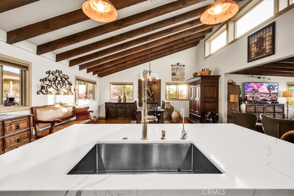 4565 Rock Corral Road Johnson Valley, CA 92285 - Photo 20 of 75 a view of a living room with furniture and a flat screen tv