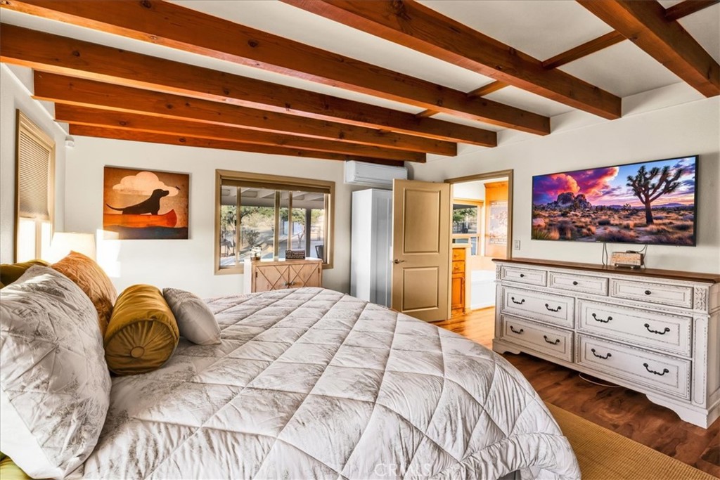 4565 Rock Corral Road Johnson Valley, CA 92285 - Photo 25 of 75 a bedroom with a bed and a flat screen tv