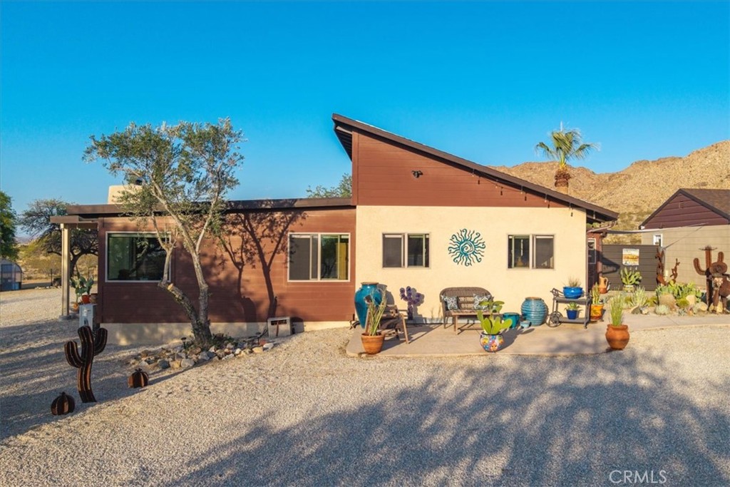 4565 Rock Corral Road Johnson Valley, CA 92285 - Photo 3 of 75 a front view of a house with patio