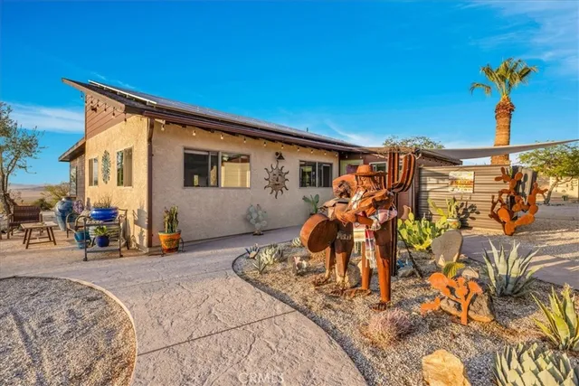 a view of a patio with chairs and tables
