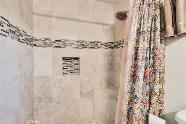 a view of a chairs and table in the patio