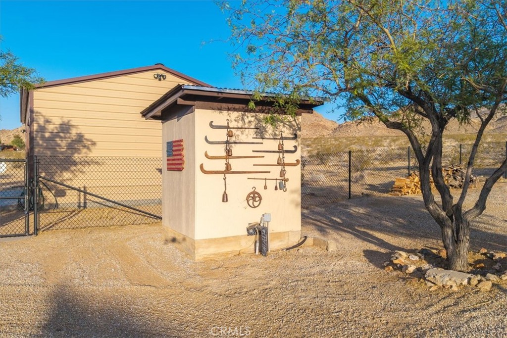 4565 Rock Corral Road Johnson Valley, CA 92285 - Photo 62 of 75 a blue sign that is on the side of the road