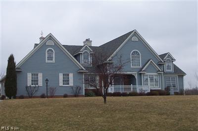 Front View - 3,009 sq. ft. cutome Keith Luck built colonial features spacious first floor which includes stunning 2 story foyer w/angled staircase; living room; dining room w/hardwood floors; family room w/natural stone gas fireplace; hearth room with brick gas fireplace; master bedroom w/vaulted ceiling; 3 closets, plant shelf, window seat; MBA with garden tub, shower and his and her sinks.  2nd floor includes huge loft overlooking 2 story foyer; 2 large bedrooms; full bath w/seperate tub & shower, his & h