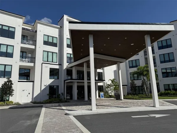 a view of a building with a glass door