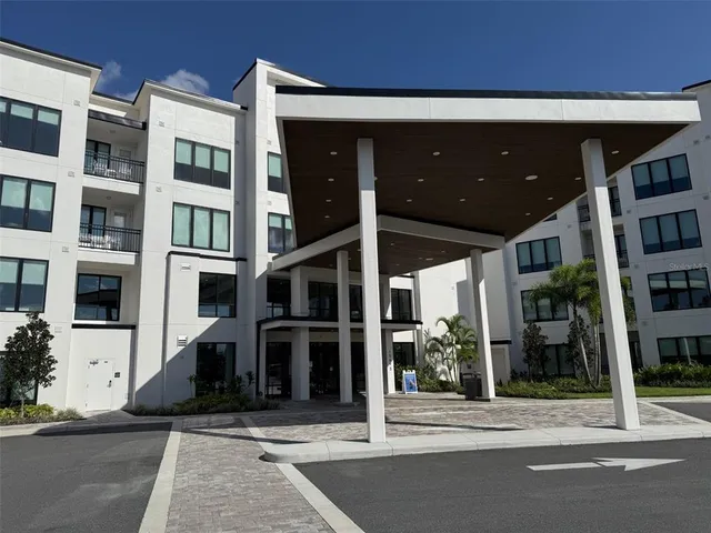 a view of a building with a glass door