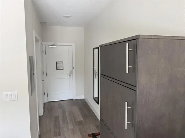 a view of a livingroom with wooden floor