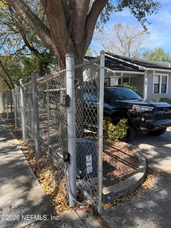 a view of a porch with a bench in patio