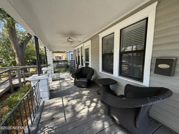 a view of living room filled with furniture