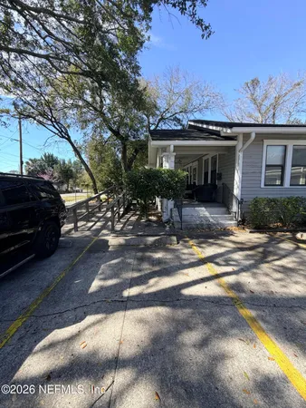 a view of a street with houses