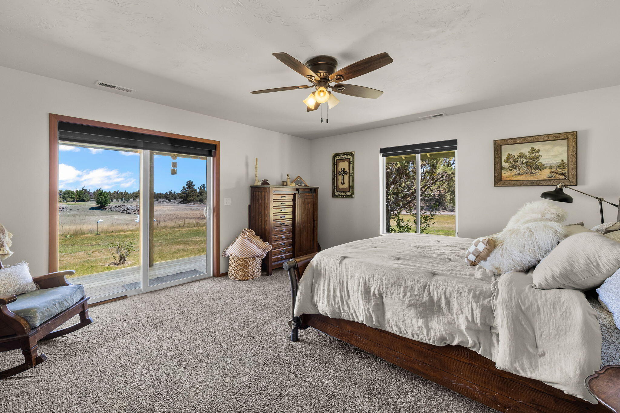 63639 Gentry Loop Bend, OR 97701 - Photo 16 of 40 a bed room with a bed and a large window
