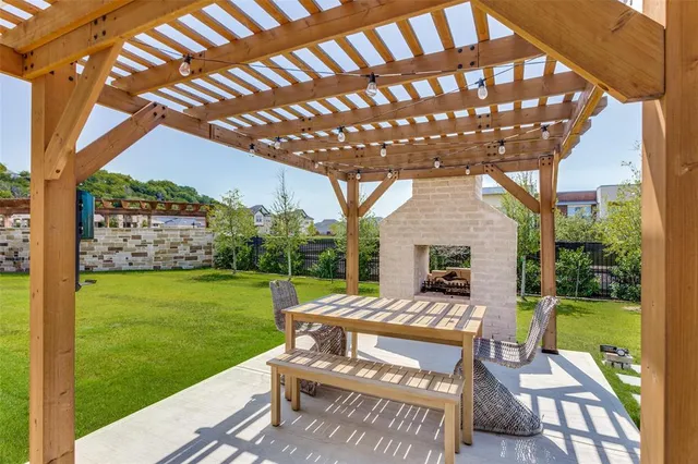 a view of yard with patio