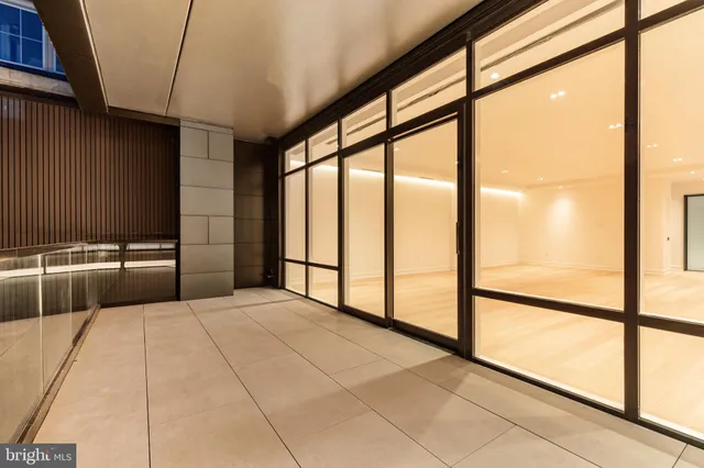 a spacious bathroom with a granite countertop sink