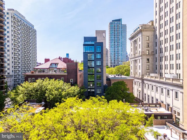 a view of a city and tall buildings