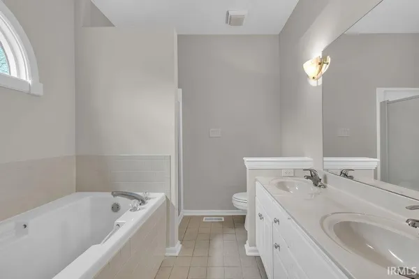 $419,900 | 3821 East Tamarron Drive, Bloomington, IN 47408