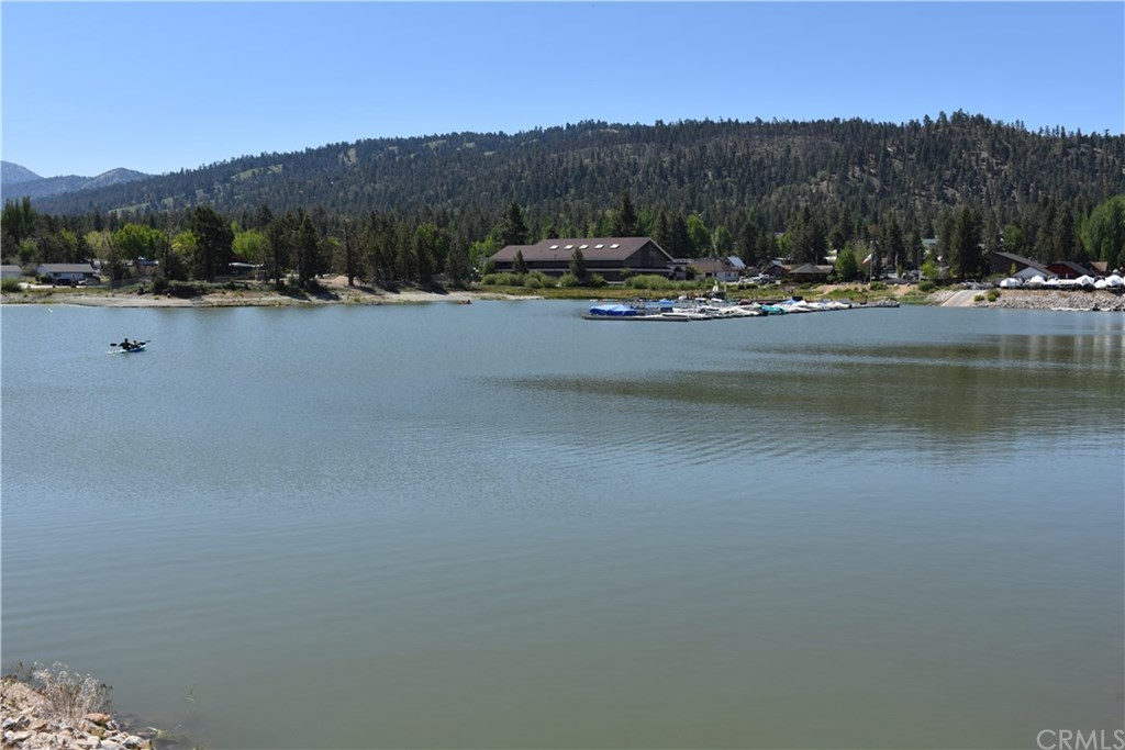 400 Pine Knot Avenue, Unit E20 Big Bear Lake, CA 92315 - Photo 15 of 17 a view of lake with mountain