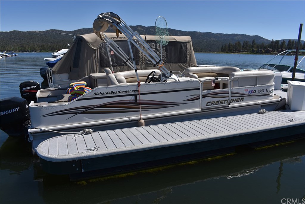 400 Pine Knot Avenue, Unit E20 Big Bear Lake, CA 92315 - Photo 4 of 17 a view of a balcony with furniture
