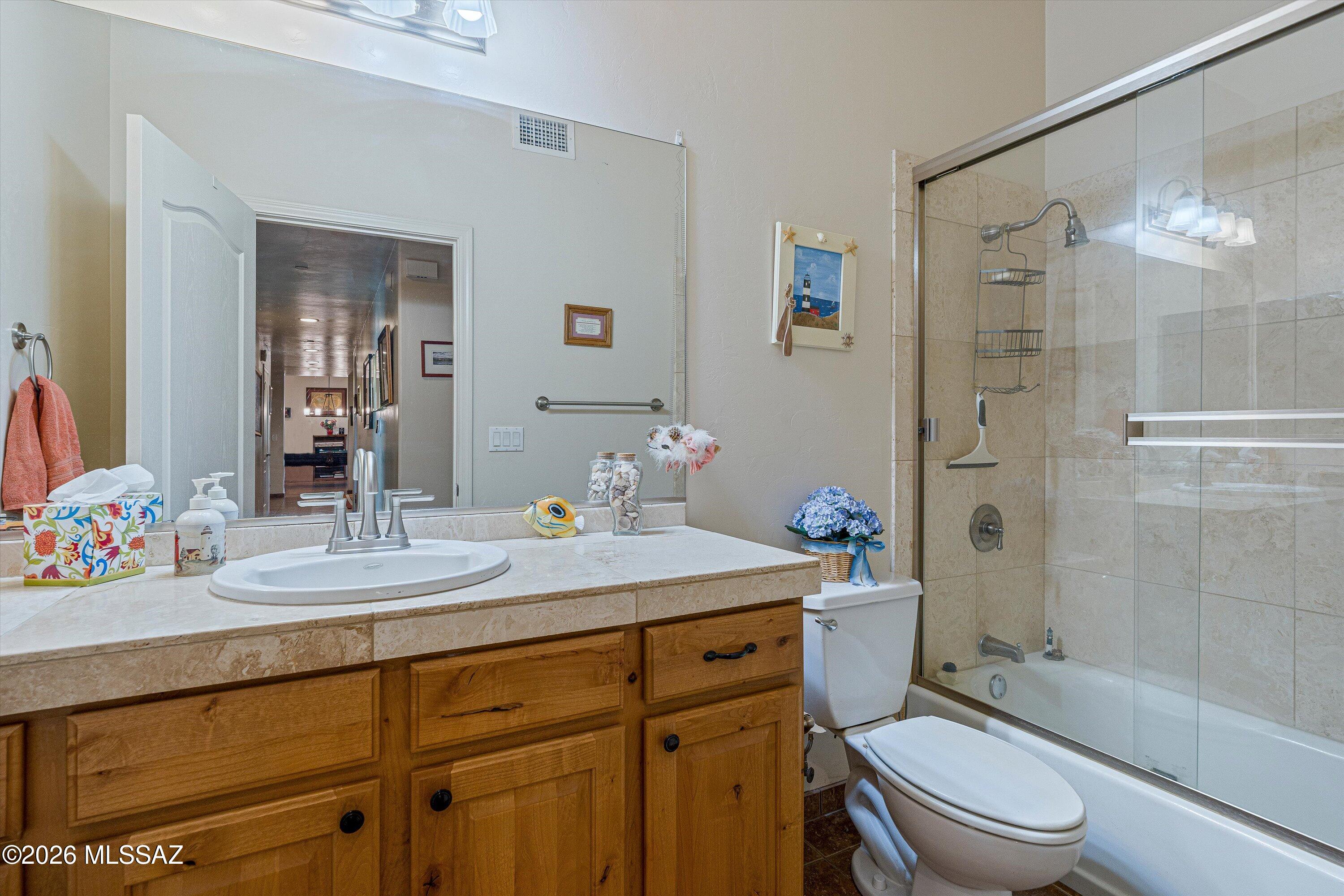 4677 East Rail N Road Tucson, AZ 85739 - Photo 19 of 48 Hall full bathroom off kitchen next to laundry room
