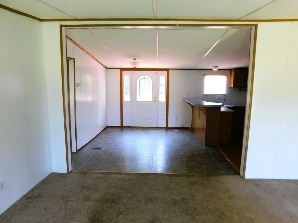 5460 Kentuck Road Ringgold, VA 24586 - Photo 24 of 37 Living room view towards dining room 12'3" x 10'1"
