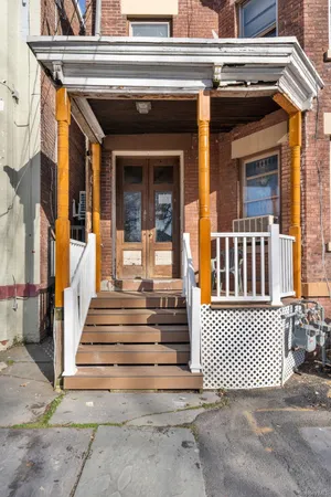 a view of a house with a gate