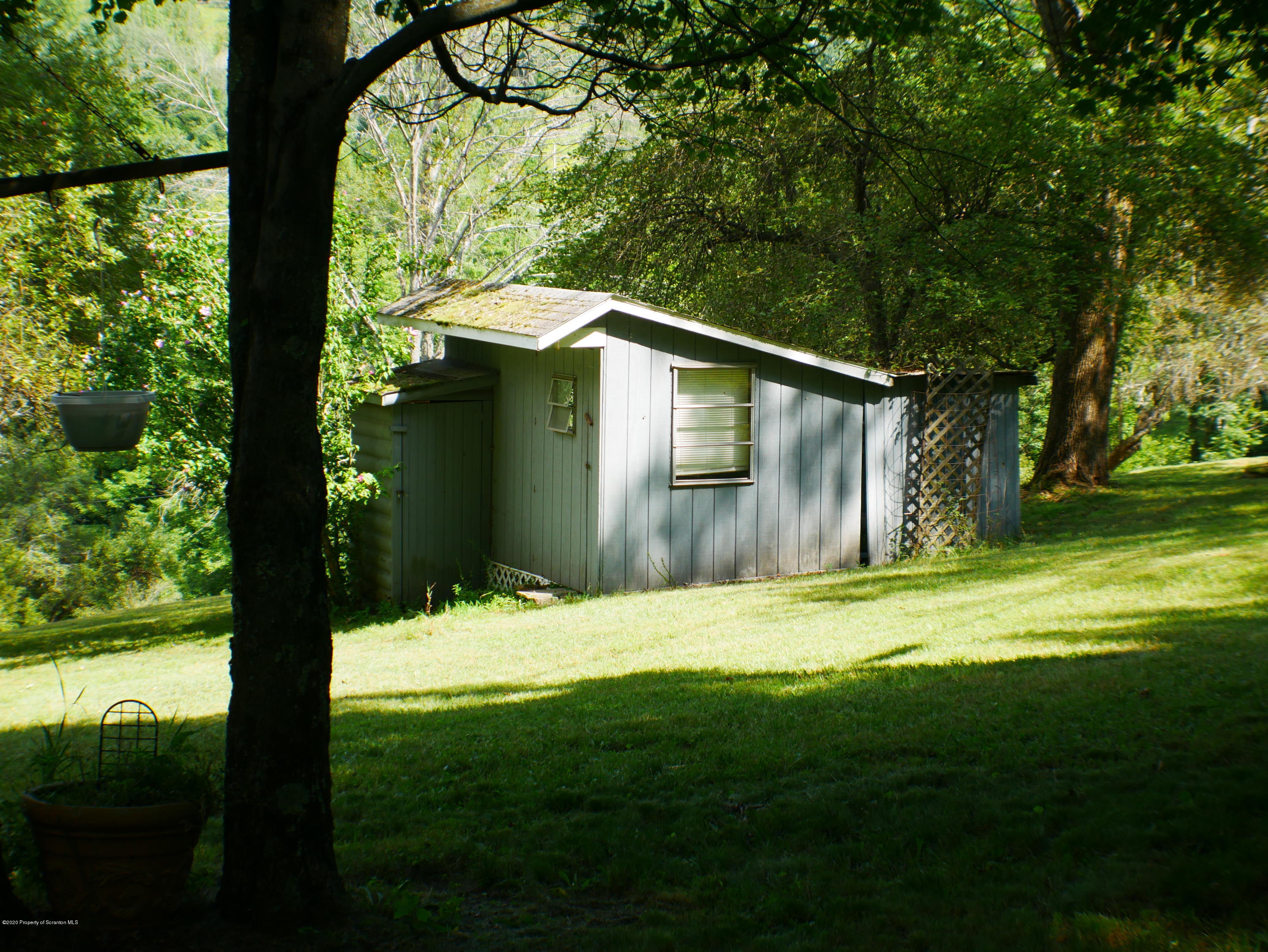 1404 Barrett Road Susquehanna, PA 18847 - Photo 3 of 15 a backyard of a house with lots of green space