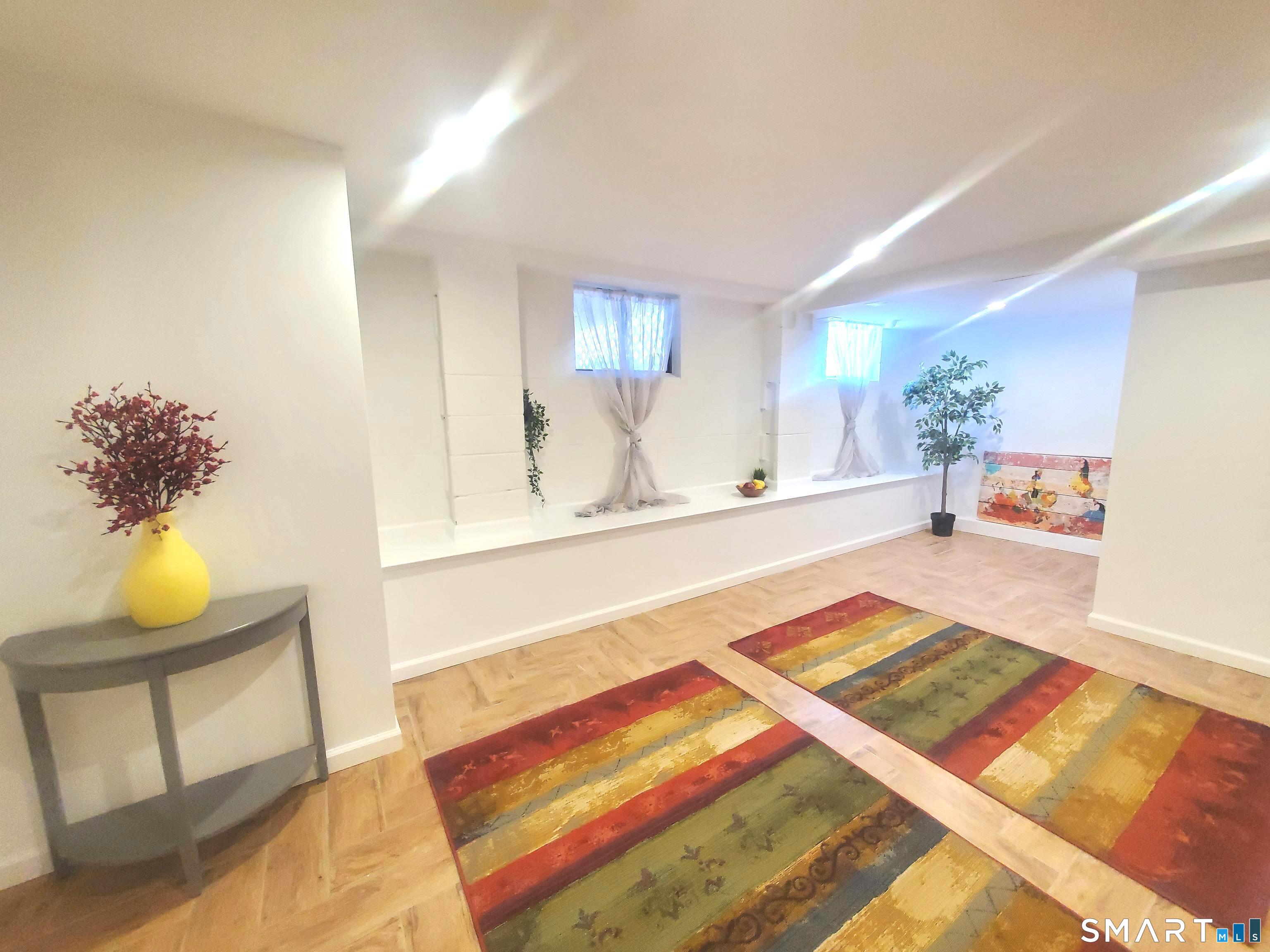 42 County Street Norwalk, CT 06851 - Photo 15 of 21 a living room with a rug