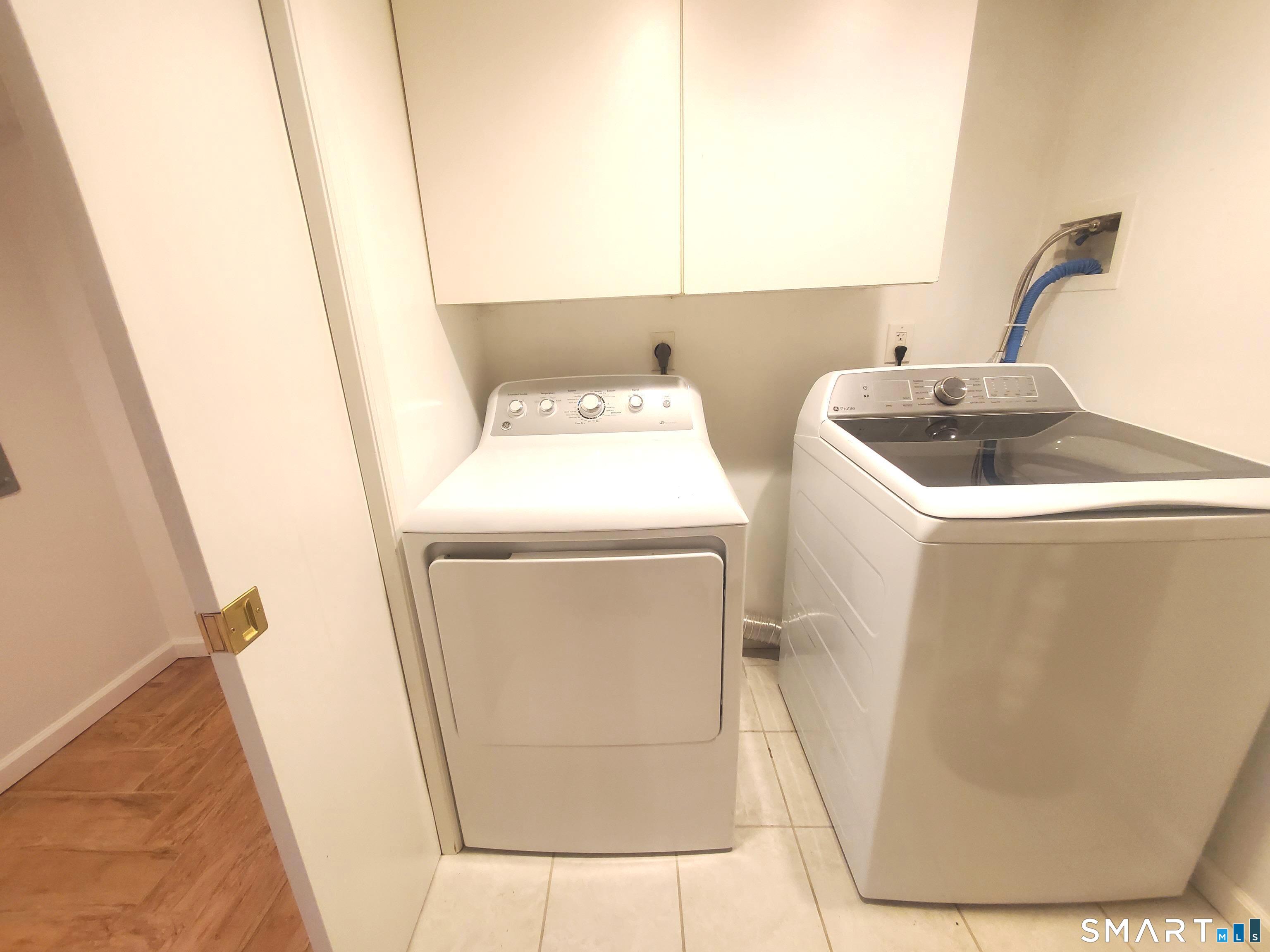 42 County Street Norwalk, CT 06851 - Photo 21 of 21 a utility room with dryer and washer