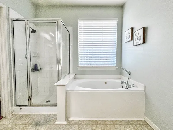 a bathroom with a sink a mirror and a toilet