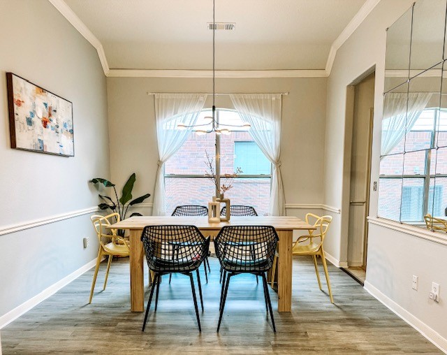 2727 Sunbird Drive Houston, TX 77084 - Photo 7 of 34 a view of a dining room with furniture window and wooden floor
