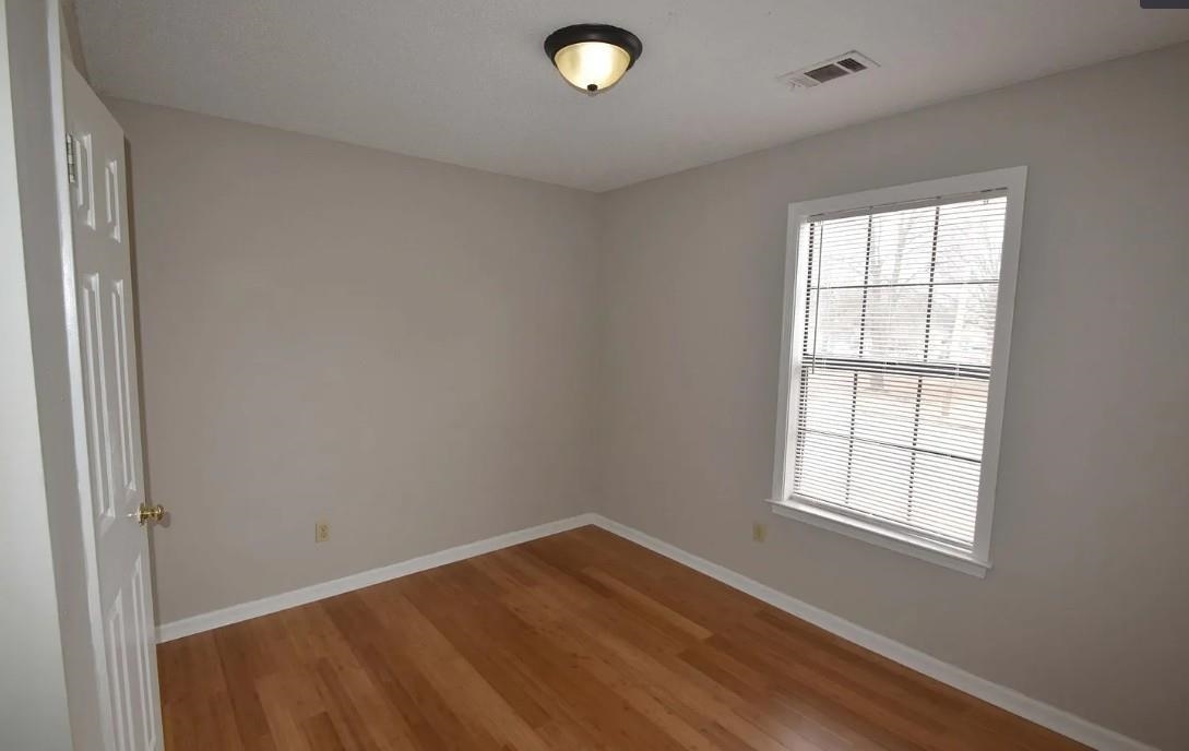 7605 Reese Road Memphis, TN 38133 - Photo 7 of 11 an empty room with a window