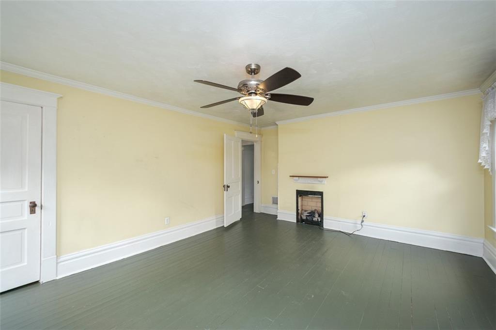 114 Cemetery Road Perryopolis, PA 15473 - Photo 16 of 35 an empty room with a empty space and a ceiling fan