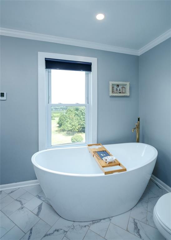 114 Cemetery Road Perryopolis, PA 15473 - Photo 19 of 35 a white bath tub sitting in a bathroom