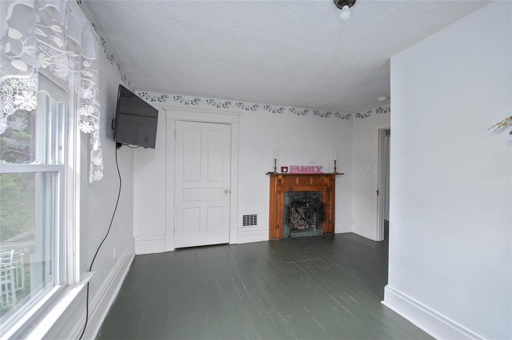 114 Cemetery Road Perryopolis, PA 15473 - Photo 26 of 35 a view of a livingroom with a fireplace