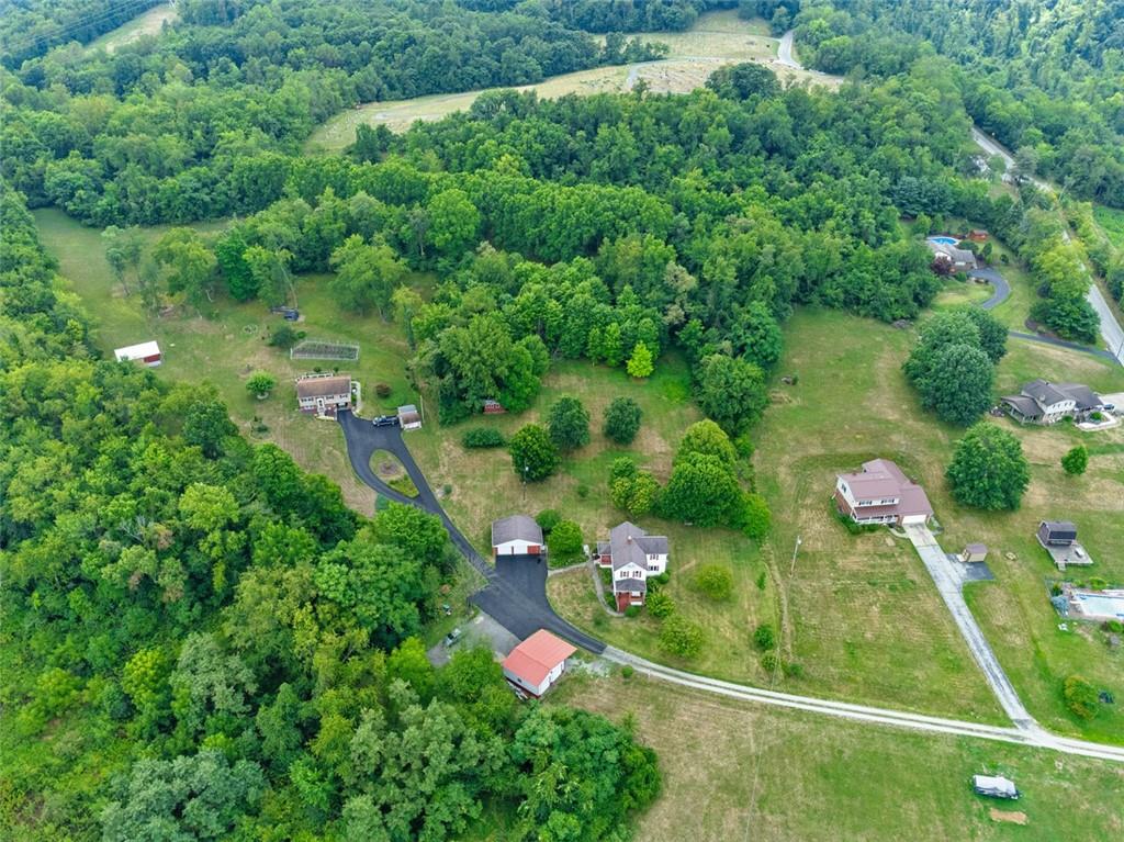 114 Cemetery Road Perryopolis, PA 15473 - Photo 34 of 35 an aerial view of residential houses with outdoor space and street view