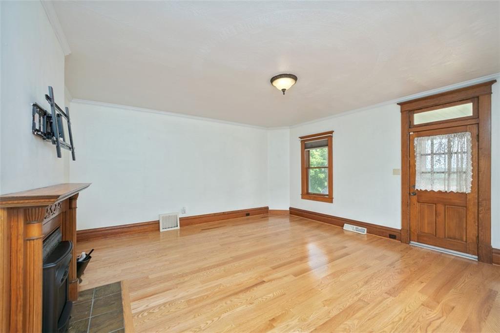 114 Cemetery Road Perryopolis, PA 15473 - Photo 4 of 35 an empty room with windows