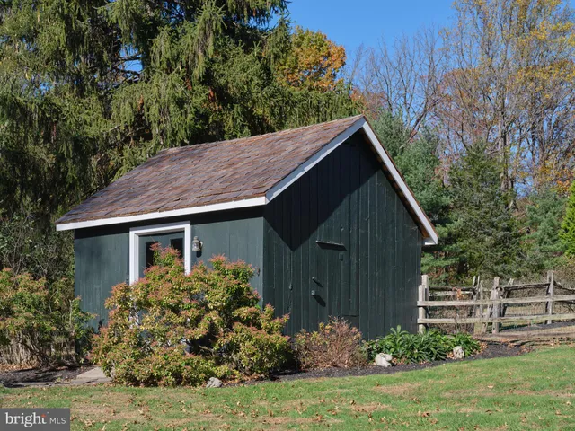 a view of a livingroom with furniture and a fireplace